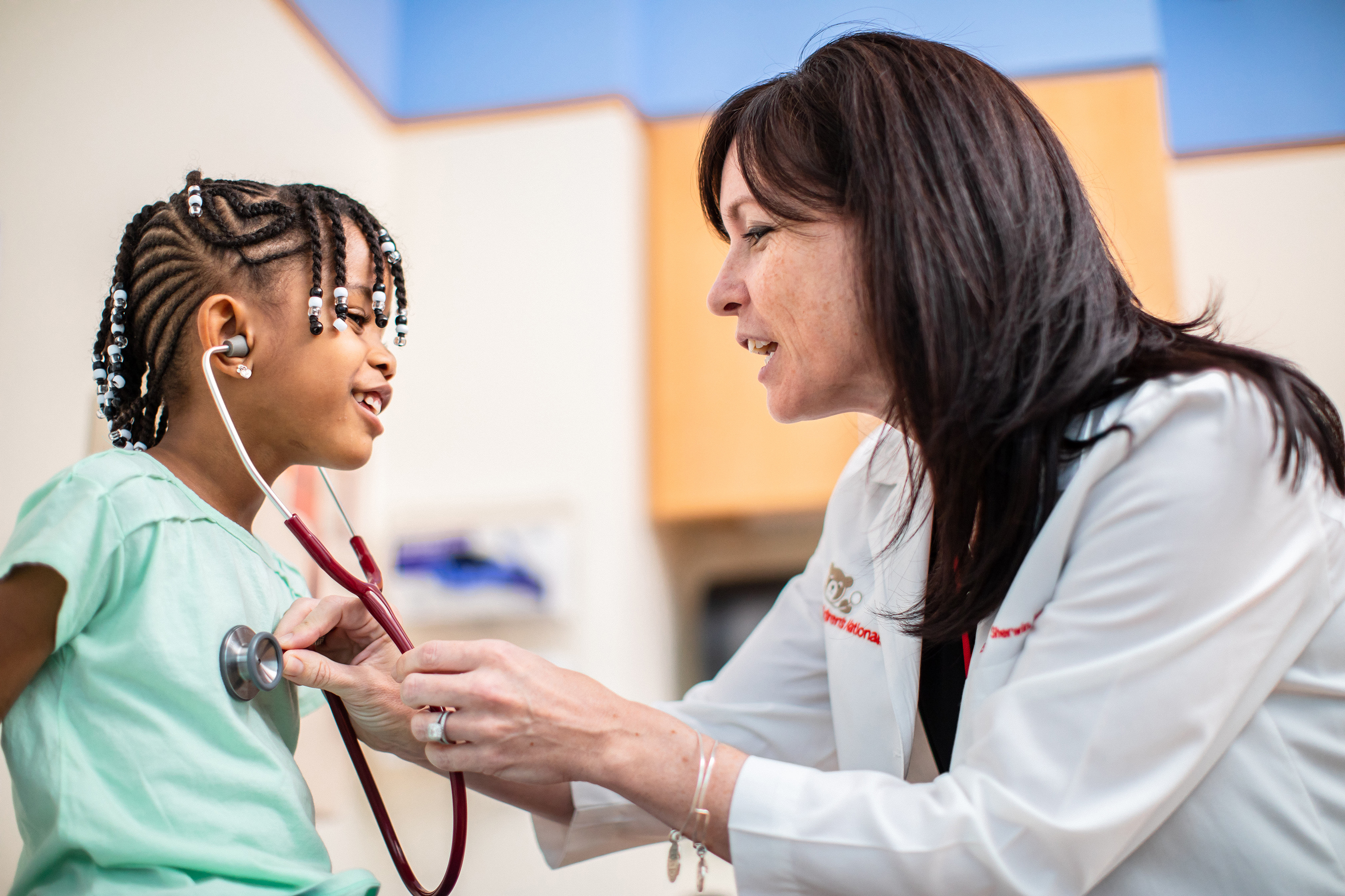 Cardiologist and Patient with Stethoscope